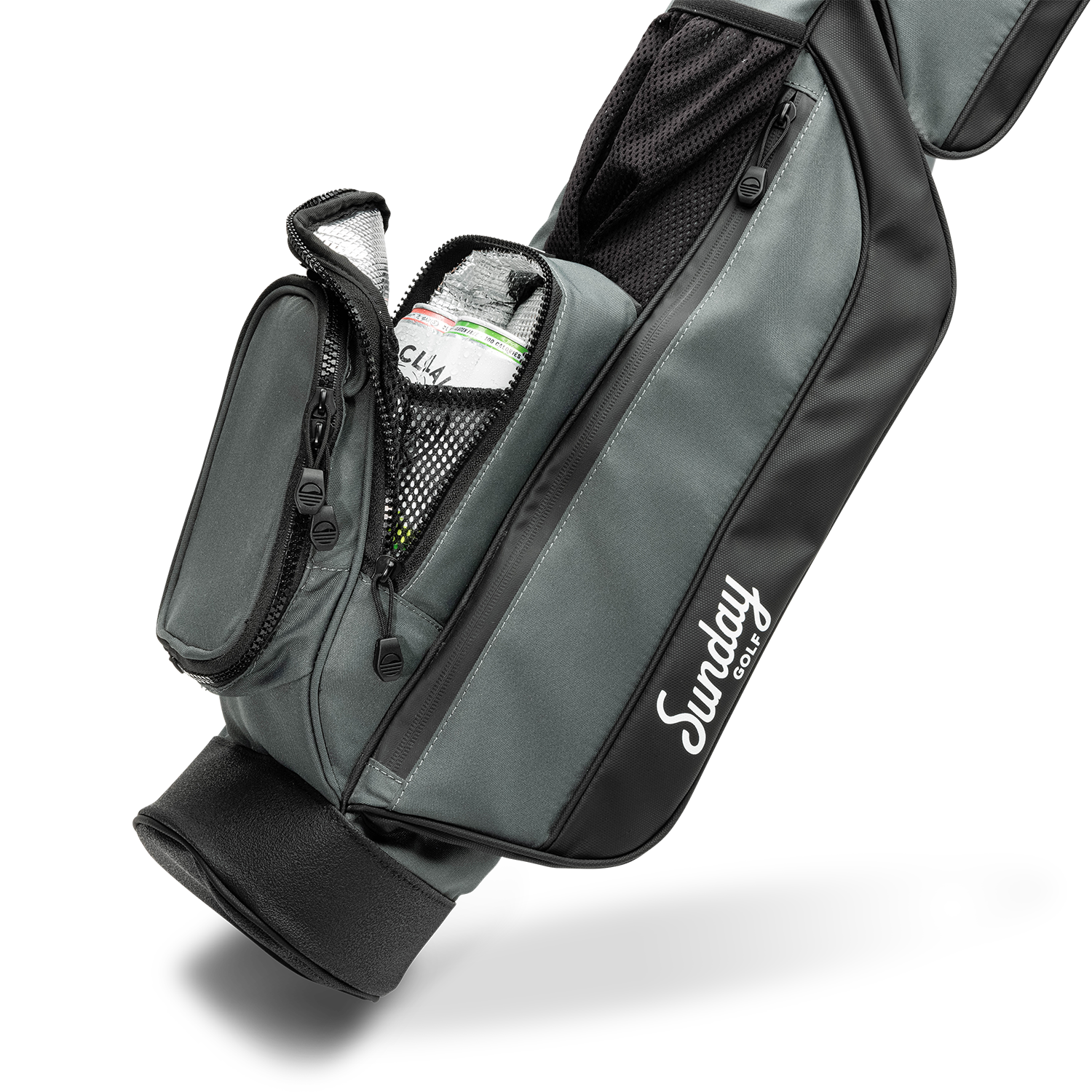 detail photo of insulated cooler pocket on Midnight Green Loma Bag with two beverages