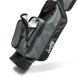 detail photo of insulated cooler pocket on Midnight Green Loma Bag with two beverages