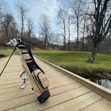 Sandstone Loma Bag by Sunday Golf on the golf course with a river and bridge