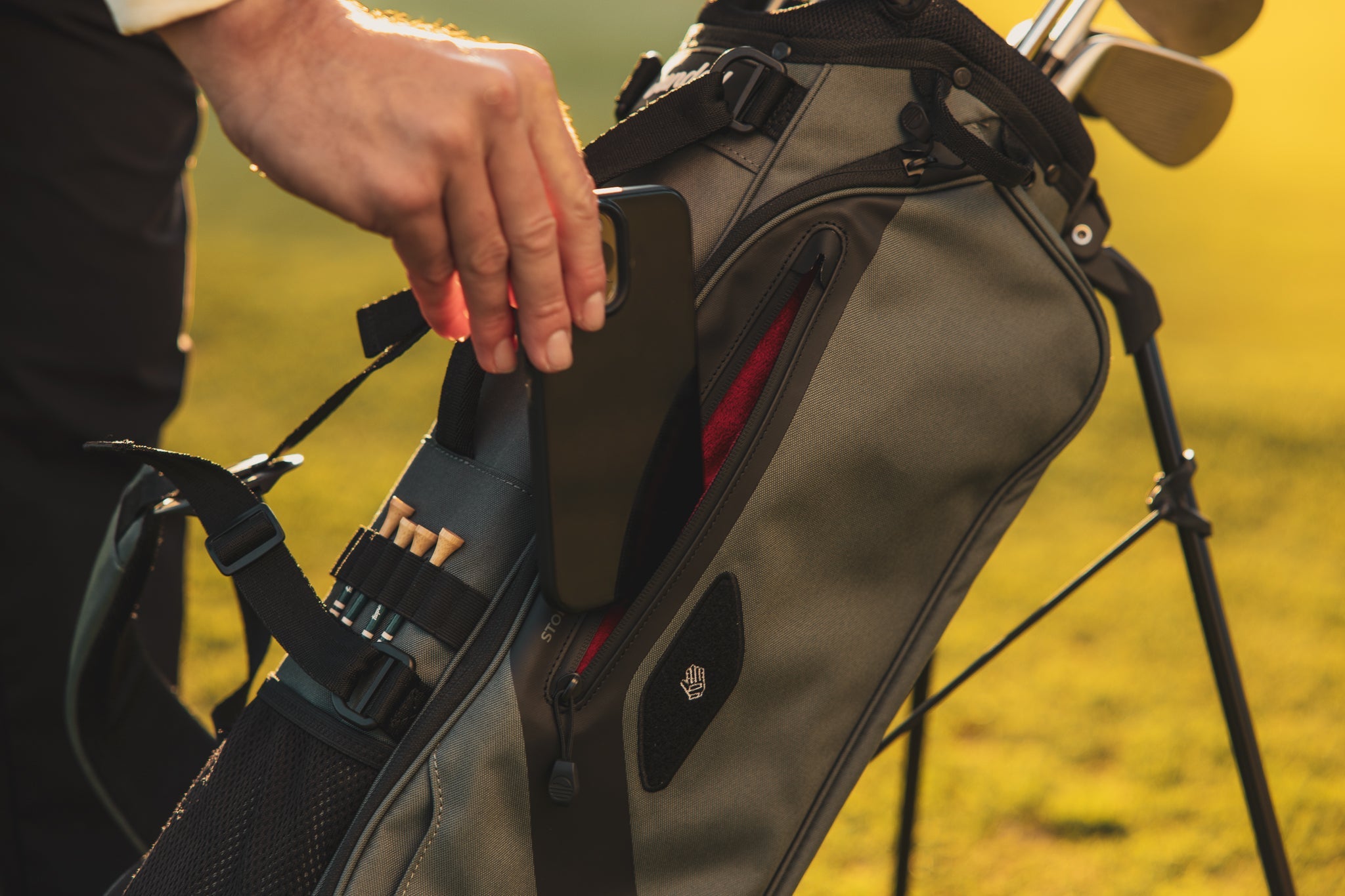 detail photo of the valuables pouch on the Midnight Green El Camino golf bag by Sunday Golf